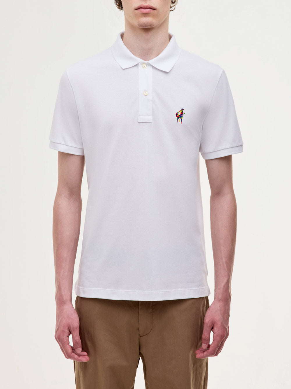 Polo in piquet stretch con logo ricamato
