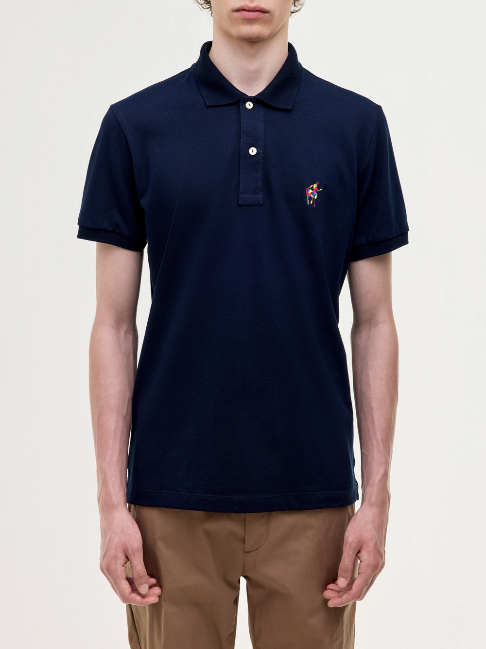 Polo in piquet stretch con logo ricamato