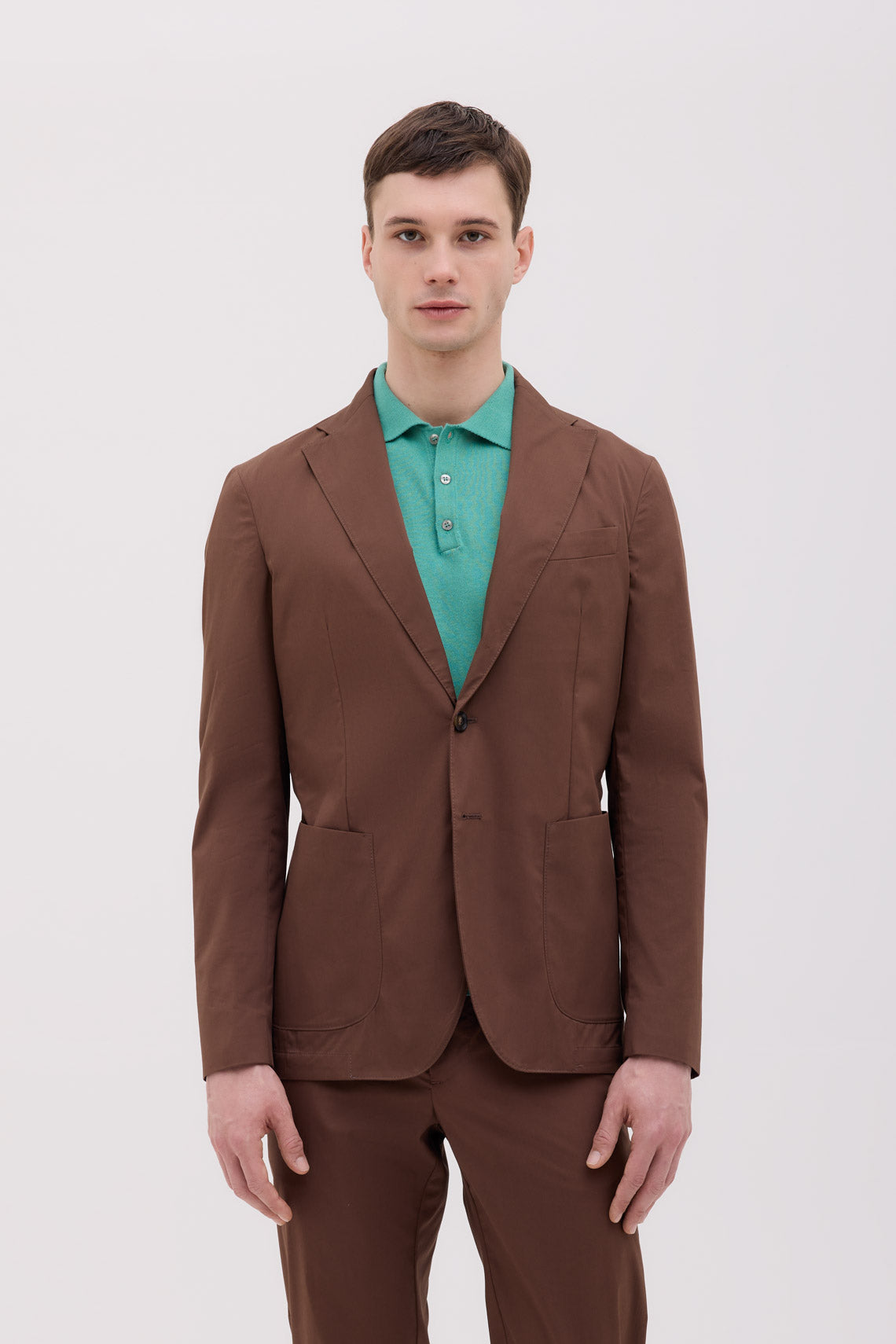 GIACCA DUE BOTTONI CON SPACCHIO LATERALI IN POPELINE TECNICO